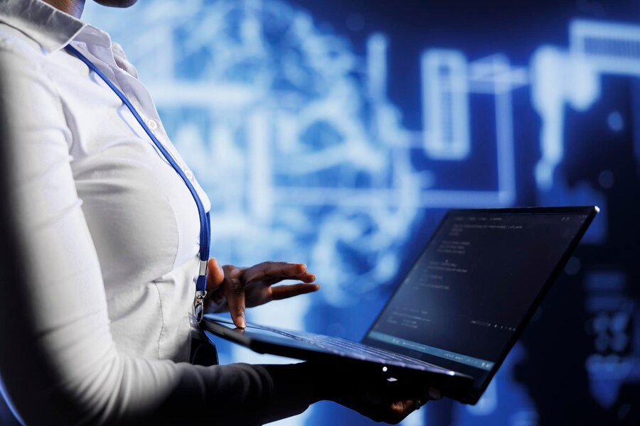 admin uses laptop develop technologically advanced artificial intelligence neural networks nodes modeled after human brain worker setting up ai machine learning pattern recognition 482257 70269