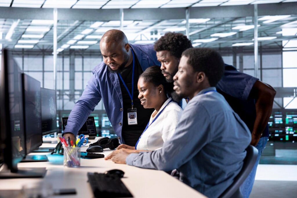 group technicians doing brainstorming reconfiguring server farm 482257 118007